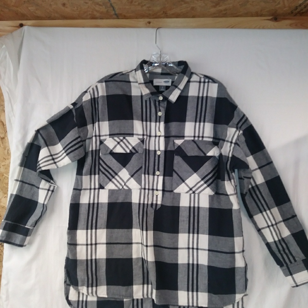 Woman's long sleeve plaid shirt.